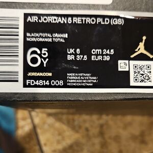 Jordan Sneakers with Black and Orange Accents